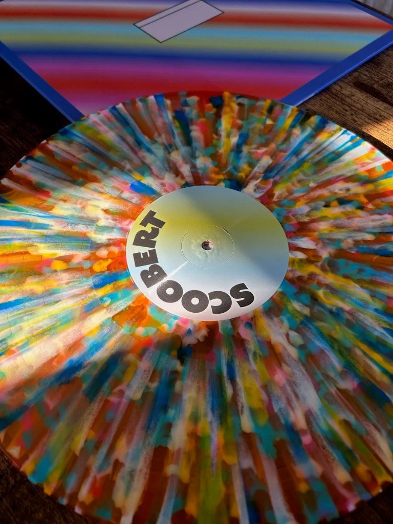 Close view of the daydreaming splatter vinyl. The center label reads SCOOBERT.